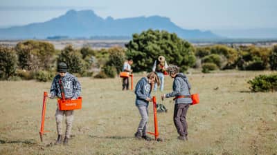 Volunteers doing revegetation work at Monjebup Reserve.