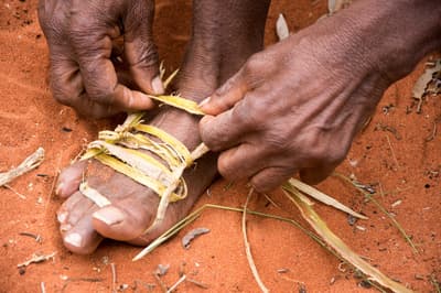 Traditional shoe weaving demonstration.