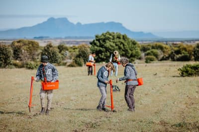 Volunteers doing revegetation work at Monjebup Reserve.